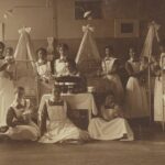 Photo of nurses with newborn babies in hospital Wilhelmina Gasthuis (photo Beeldbank Stadsarchief Amsterdam)